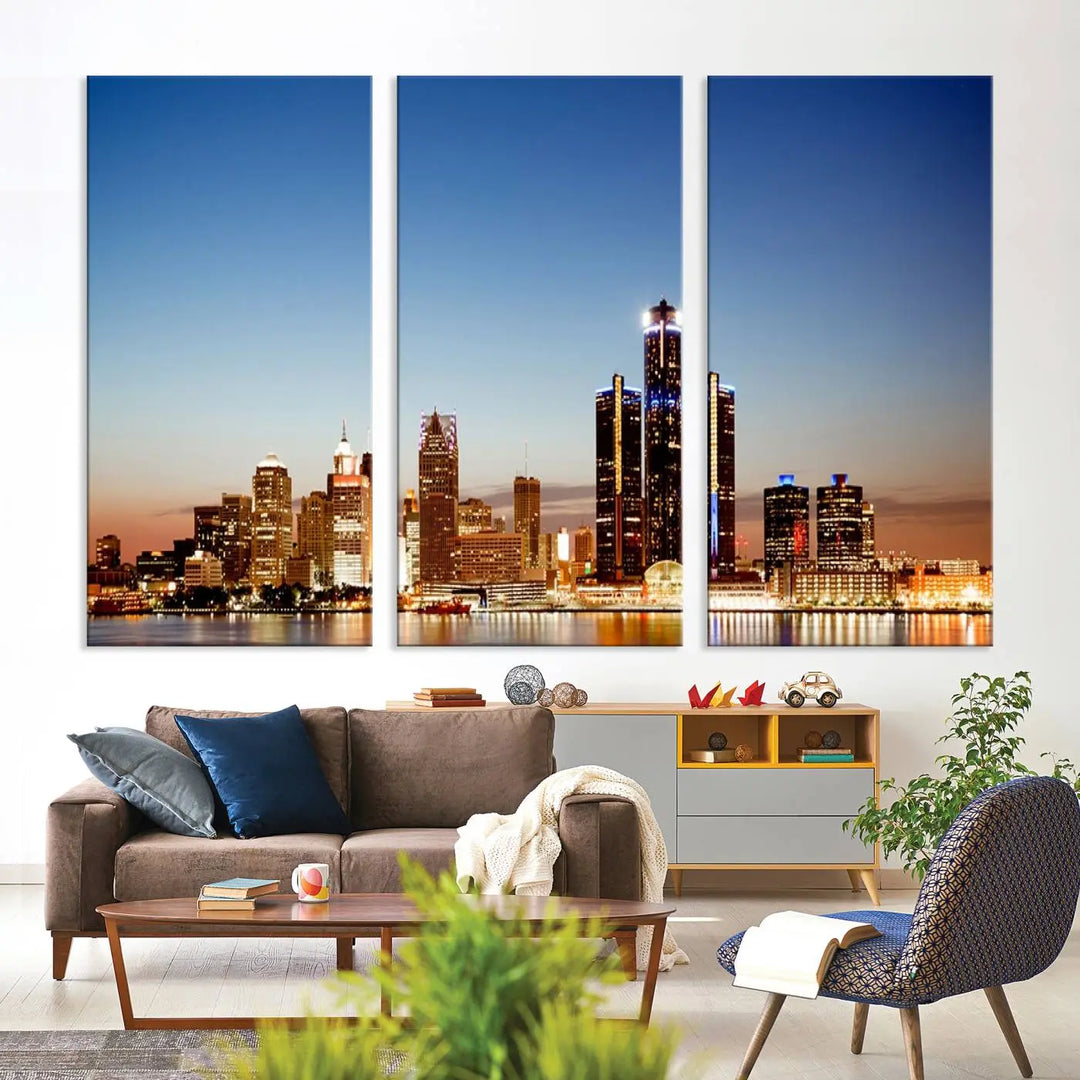 The Detroit City Lights Sunset Skyline Cityscape View Wall Art Canvas Print is displayed as a triptych. This artwork is printed on museum-quality canvas with a UV-protective coating and includes free shipping.