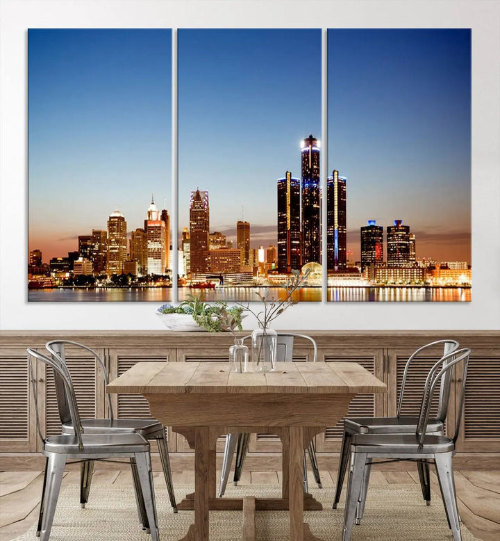 The Detroit City Lights Sunset Skyline Cityscape View Wall Art Canvas Print is displayed as a triptych. This artwork is printed on museum-quality canvas with a UV-protective coating and includes free shipping.