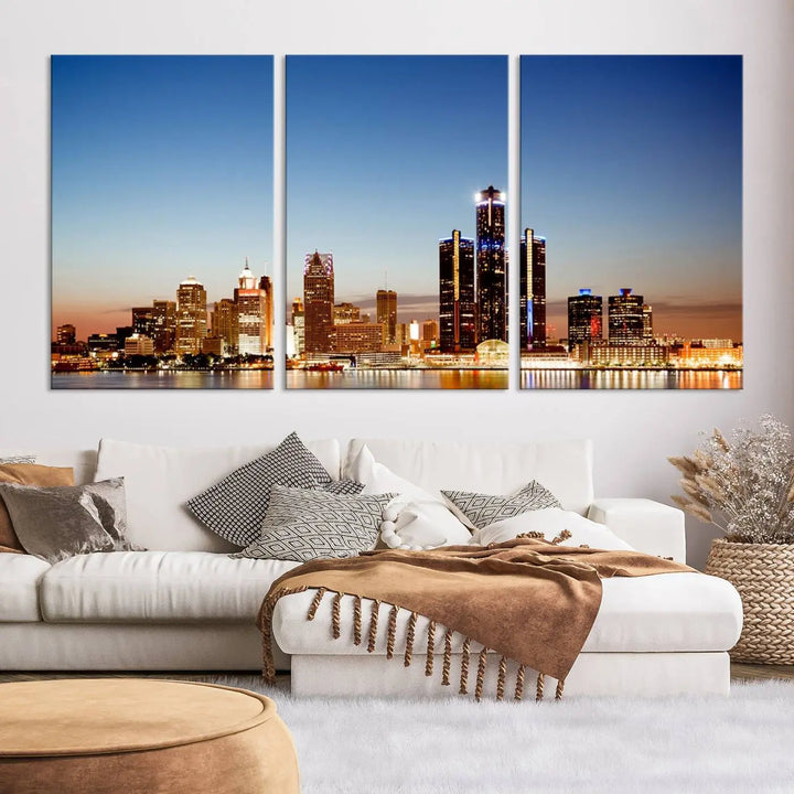 The Detroit City Lights Sunset Skyline Cityscape View Wall Art Canvas Print is displayed as a triptych. This artwork is printed on museum-quality canvas with a UV-protective coating and includes free shipping.