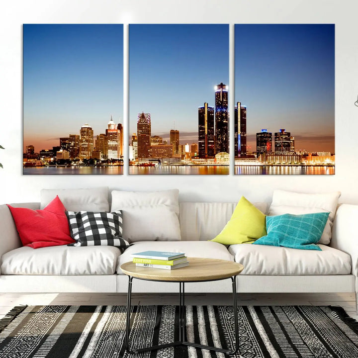 The Detroit City Lights Sunset Skyline Cityscape View Wall Art Canvas Print is displayed as a triptych. This artwork is printed on museum-quality canvas with a UV-protective coating and includes free shipping.