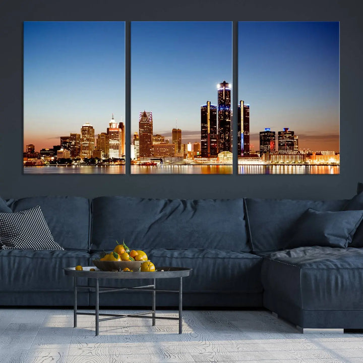 The Detroit City Lights Sunset Skyline Cityscape View Wall Art Canvas Print is displayed as a triptych. This artwork is printed on museum-quality canvas with a UV-protective coating and includes free shipping.