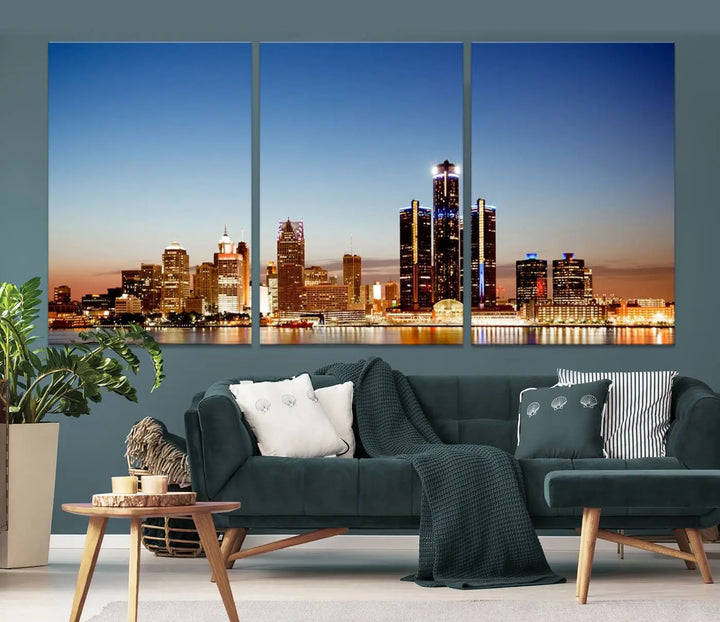 The Detroit City Lights Sunset Skyline Cityscape View Wall Art Canvas Print is displayed as a triptych. This artwork is printed on museum-quality canvas with a UV-protective coating and includes free shipping.