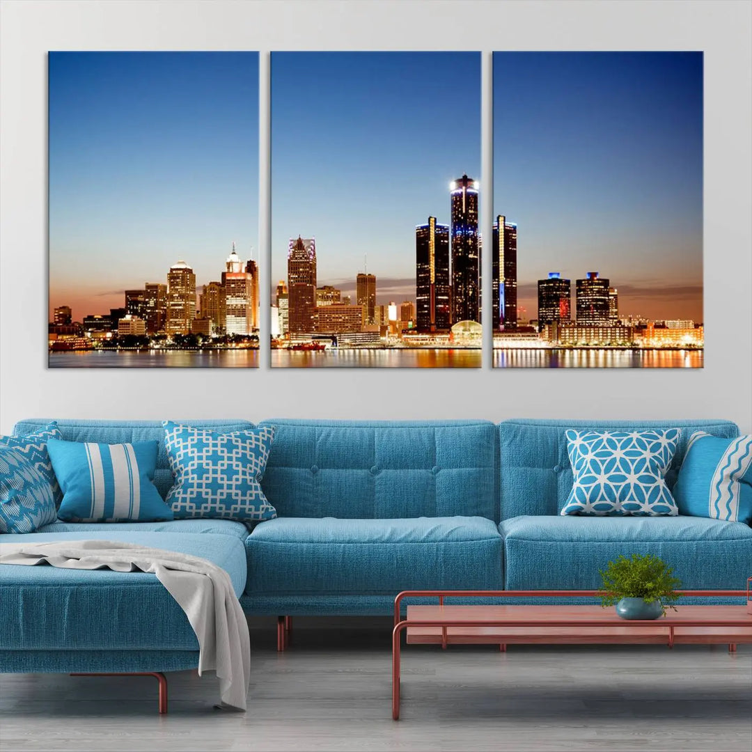 The Detroit City Lights Sunset Skyline Cityscape View Wall Art Canvas Print is displayed as a triptych. This artwork is printed on museum-quality canvas with a UV-protective coating and includes free shipping.