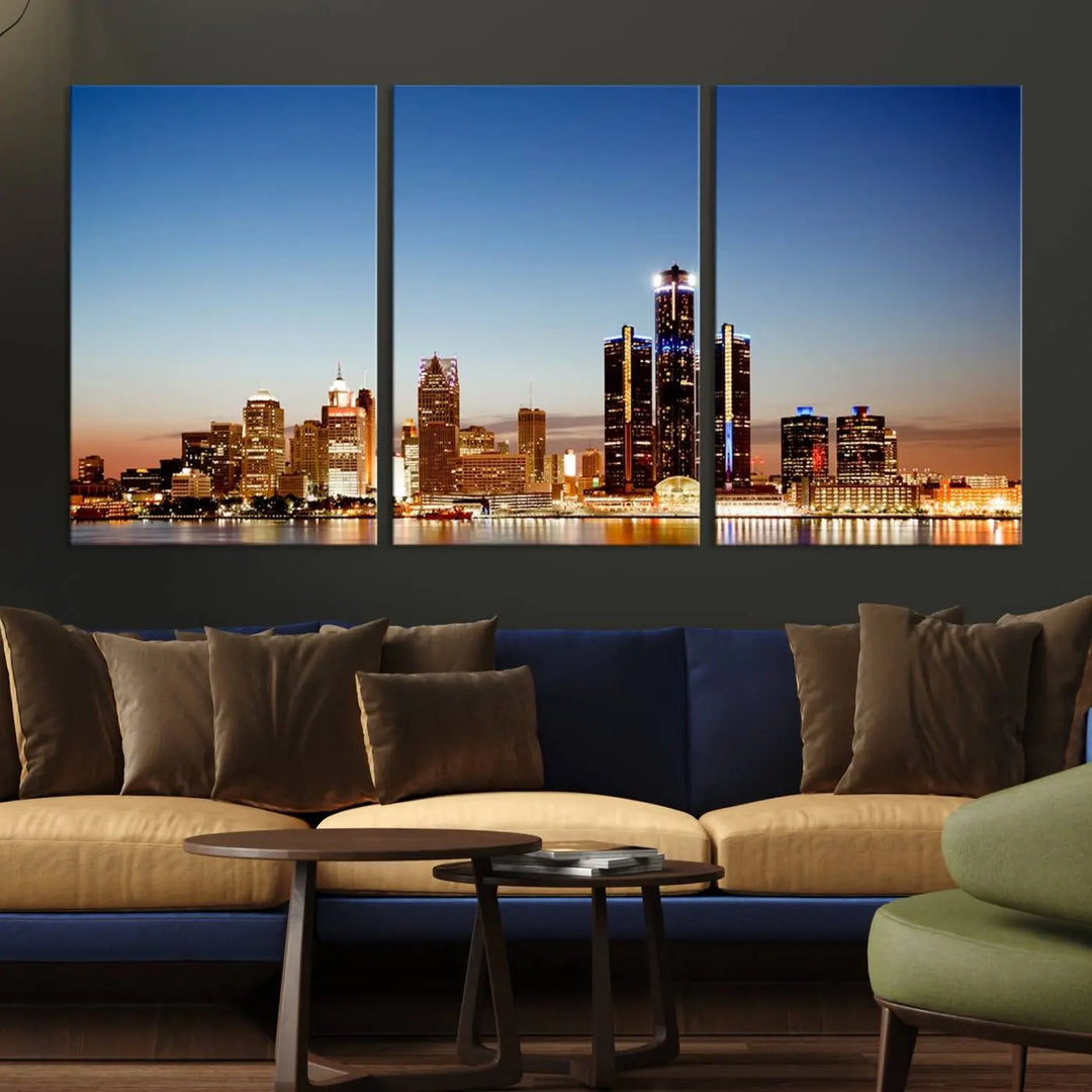 The Detroit City Lights Sunset Skyline Cityscape View Wall Art Canvas Print is displayed as a triptych. This artwork is printed on museum-quality canvas with a UV-protective coating and includes free shipping.