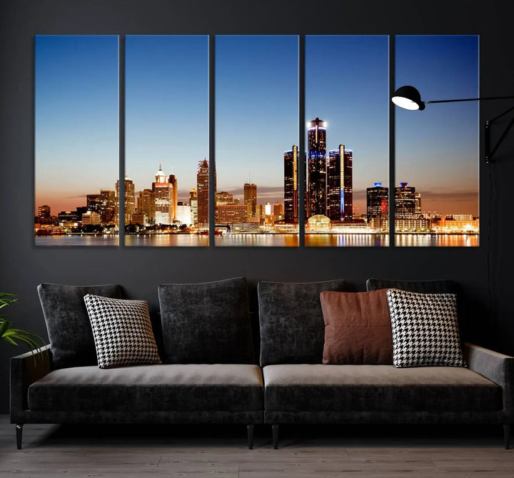 The Detroit City Lights Sunset Skyline Cityscape View Wall Art Canvas Print is displayed as a triptych. This artwork is printed on museum-quality canvas with a UV-protective coating and includes free shipping.