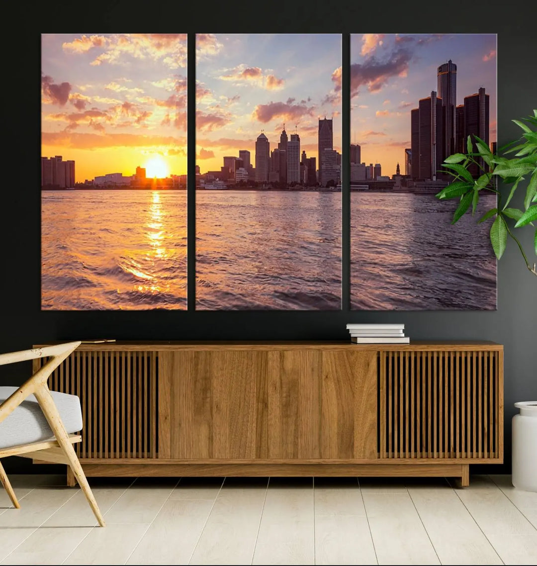 The Detroit City Sunset Skyline Cityscape View Wall Art Canvas Print, featuring a UV-protective coating, beautifully depicts a city skyline at sunset over a river. Enjoy free shipping on these museum-quality canvases, ideal for elevating your living space.