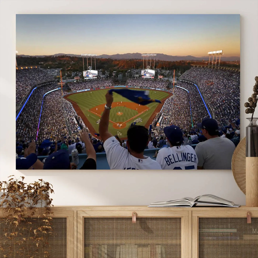 Experience the vibrant moment captured in the Dodger Stadium Sunset Game Triple Canvas Wall Art. This stunning three-panel piece showcases a breathtaking scene from a Los Angeles Dodgers MLB game during sunset, complete with cheering fans in the background.