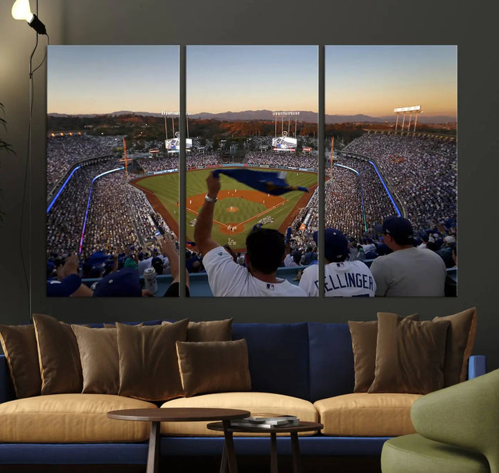 Experience the vibrant moment captured in the Dodger Stadium Sunset Game Triple Canvas Wall Art. This stunning three-panel piece showcases a breathtaking scene from a Los Angeles Dodgers MLB game during sunset, complete with cheering fans in the background.