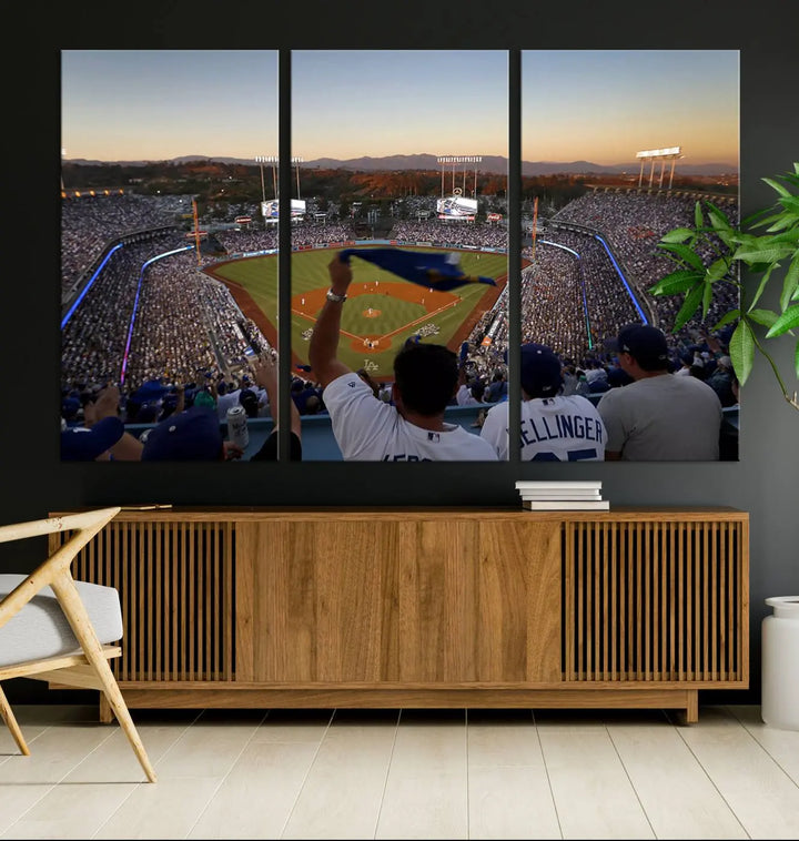 Experience the vibrant moment captured in the Dodger Stadium Sunset Game Triple Canvas Wall Art. This stunning three-panel piece showcases a breathtaking scene from a Los Angeles Dodgers MLB game during sunset, complete with cheering fans in the background.