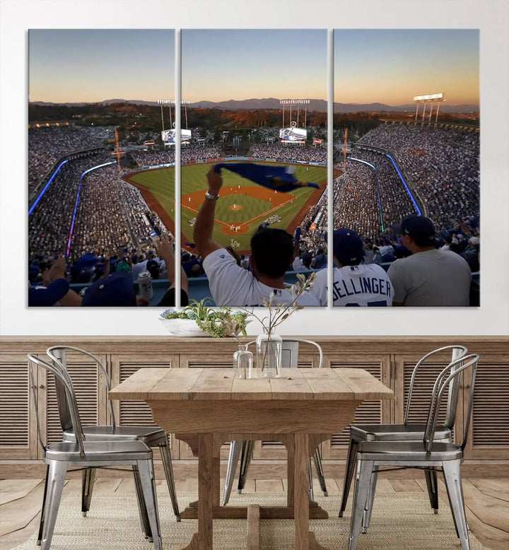 Experience the vibrant moment captured in the Dodger Stadium Sunset Game Triple Canvas Wall Art. This stunning three-panel piece showcases a breathtaking scene from a Los Angeles Dodgers MLB game during sunset, complete with cheering fans in the background.