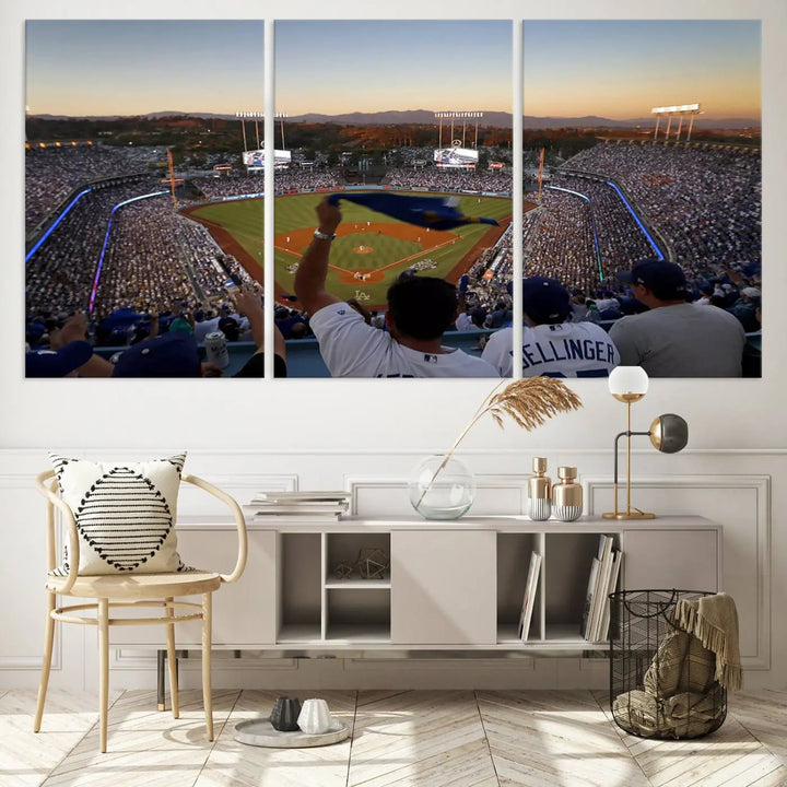 Experience the vibrant moment captured in the Dodger Stadium Sunset Game Triple Canvas Wall Art. This stunning three-panel piece showcases a breathtaking scene from a Los Angeles Dodgers MLB game during sunset, complete with cheering fans in the background.