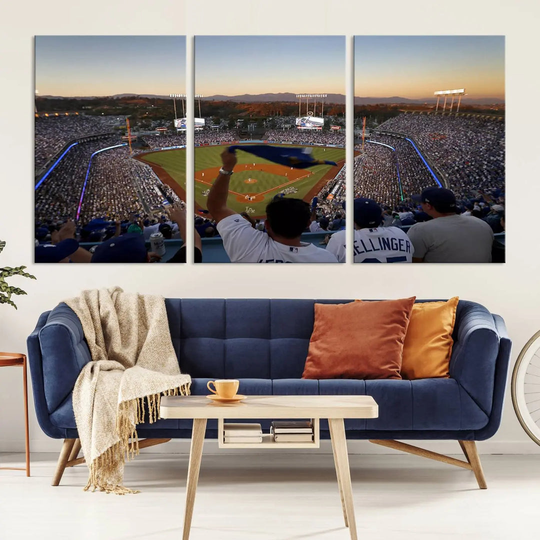 Experience the vibrant moment captured in the Dodger Stadium Sunset Game Triple Canvas Wall Art. This stunning three-panel piece showcases a breathtaking scene from a Los Angeles Dodgers MLB game during sunset, complete with cheering fans in the background.