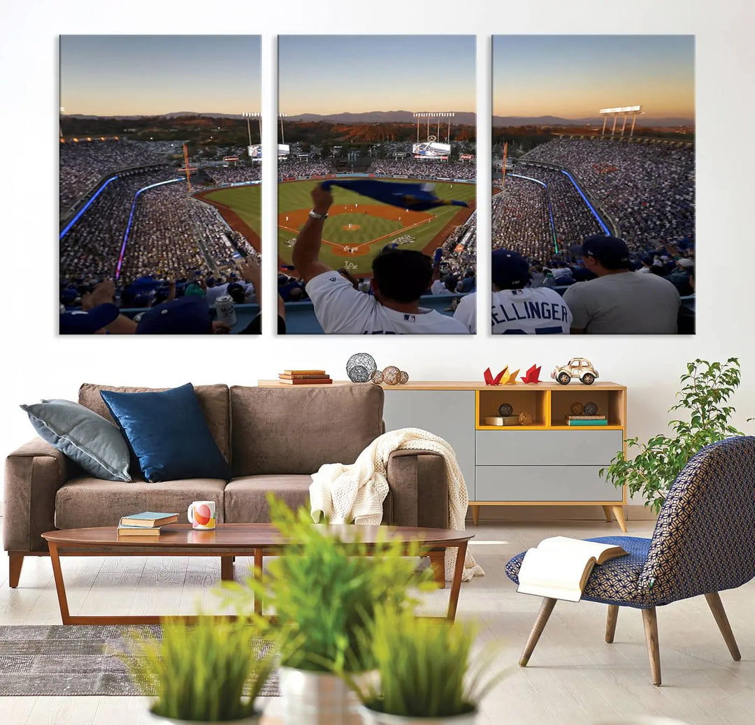 Experience the vibrant moment captured in the Dodger Stadium Sunset Game Triple Canvas Wall Art. This stunning three-panel piece showcases a breathtaking scene from a Los Angeles Dodgers MLB game during sunset, complete with cheering fans in the background.