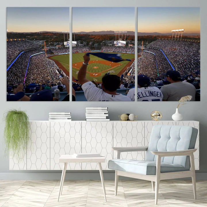 Experience the vibrant moment captured in the Dodger Stadium Sunset Game Triple Canvas Wall Art. This stunning three-panel piece showcases a breathtaking scene from a Los Angeles Dodgers MLB game during sunset, complete with cheering fans in the background.