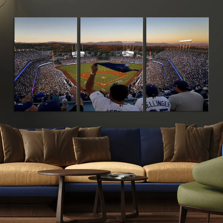 Experience the vibrant moment captured in the Dodger Stadium Sunset Game Triple Canvas Wall Art. This stunning three-panel piece showcases a breathtaking scene from a Los Angeles Dodgers MLB game during sunset, complete with cheering fans in the background.