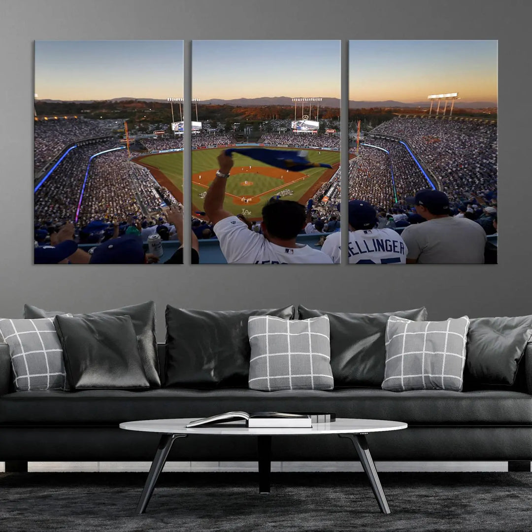 Experience the vibrant moment captured in the Dodger Stadium Sunset Game Triple Canvas Wall Art. This stunning three-panel piece showcases a breathtaking scene from a Los Angeles Dodgers MLB game during sunset, complete with cheering fans in the background.