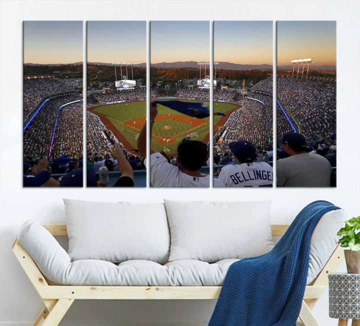 Experience the vibrant moment captured in the Dodger Stadium Sunset Game Triple Canvas Wall Art. This stunning three-panel piece showcases a breathtaking scene from a Los Angeles Dodgers MLB game during sunset, complete with cheering fans in the background.