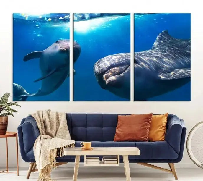 The Dolphin and Ocean Life Wall Art Canvas Print, a museum-quality piece depicting dolphins swimming, is a stunning artwork offered with free shipping.