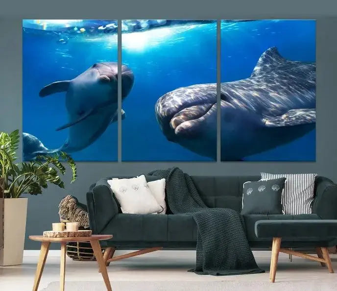 The Dolphin and Ocean Life Wall Art Canvas Print, a museum-quality piece depicting dolphins swimming, is a stunning artwork offered with free shipping.