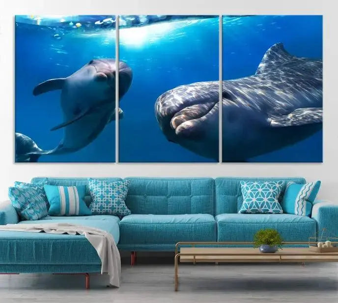 The Dolphin and Ocean Life Wall Art Canvas Print, a museum-quality piece depicting dolphins swimming, is a stunning artwork offered with free shipping.