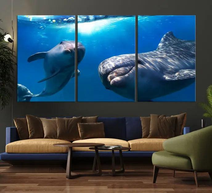 The Dolphin and Ocean Life Wall Art Canvas Print, a museum-quality piece depicting dolphins swimming, is a stunning artwork offered with free shipping.