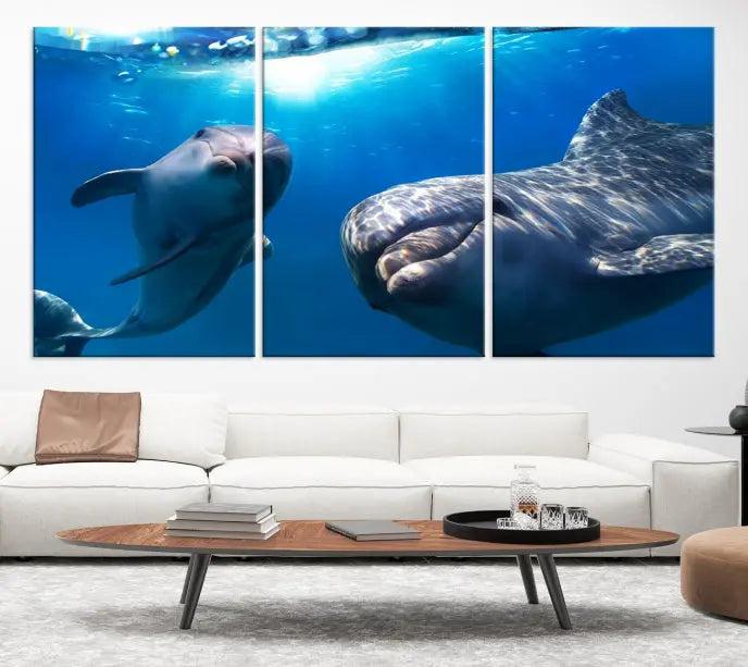 The Dolphin and Ocean Life Wall Art Canvas Print, a museum-quality piece depicting dolphins swimming, is a stunning artwork offered with free shipping.