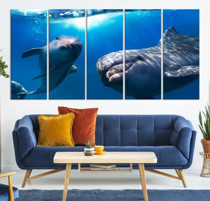 The Dolphin and Ocean Life Wall Art Canvas Print, a museum-quality piece depicting dolphins swimming, is a stunning artwork offered with free shipping.