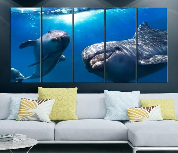 The Dolphin and Ocean Life Wall Art Canvas Print, a museum-quality piece depicting dolphins swimming, is a stunning artwork offered with free shipping.