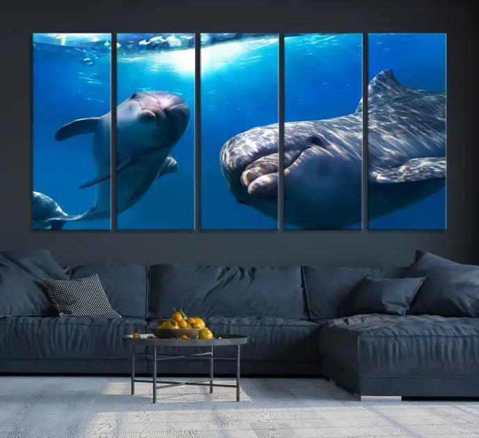 The Dolphin and Ocean Life Wall Art Canvas Print, a museum-quality piece depicting dolphins swimming, is a stunning artwork offered with free shipping.