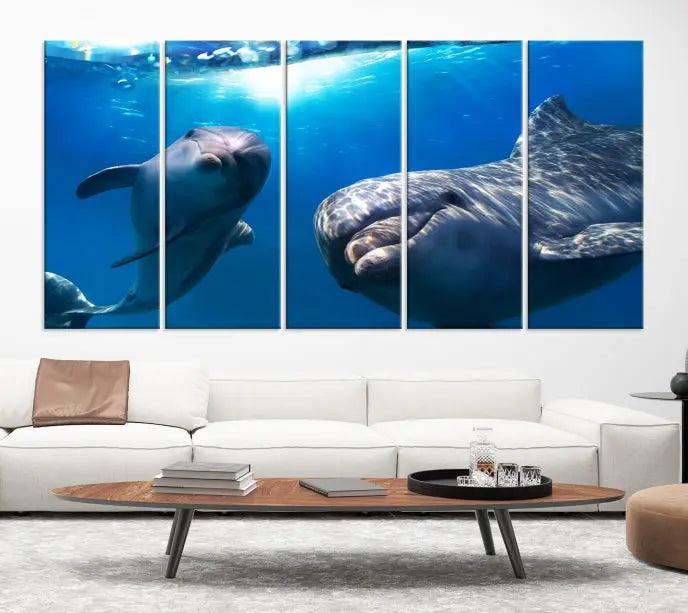 The Dolphin and Ocean Life Wall Art Canvas Print, a museum-quality piece depicting dolphins swimming, is a stunning artwork offered with free shipping.