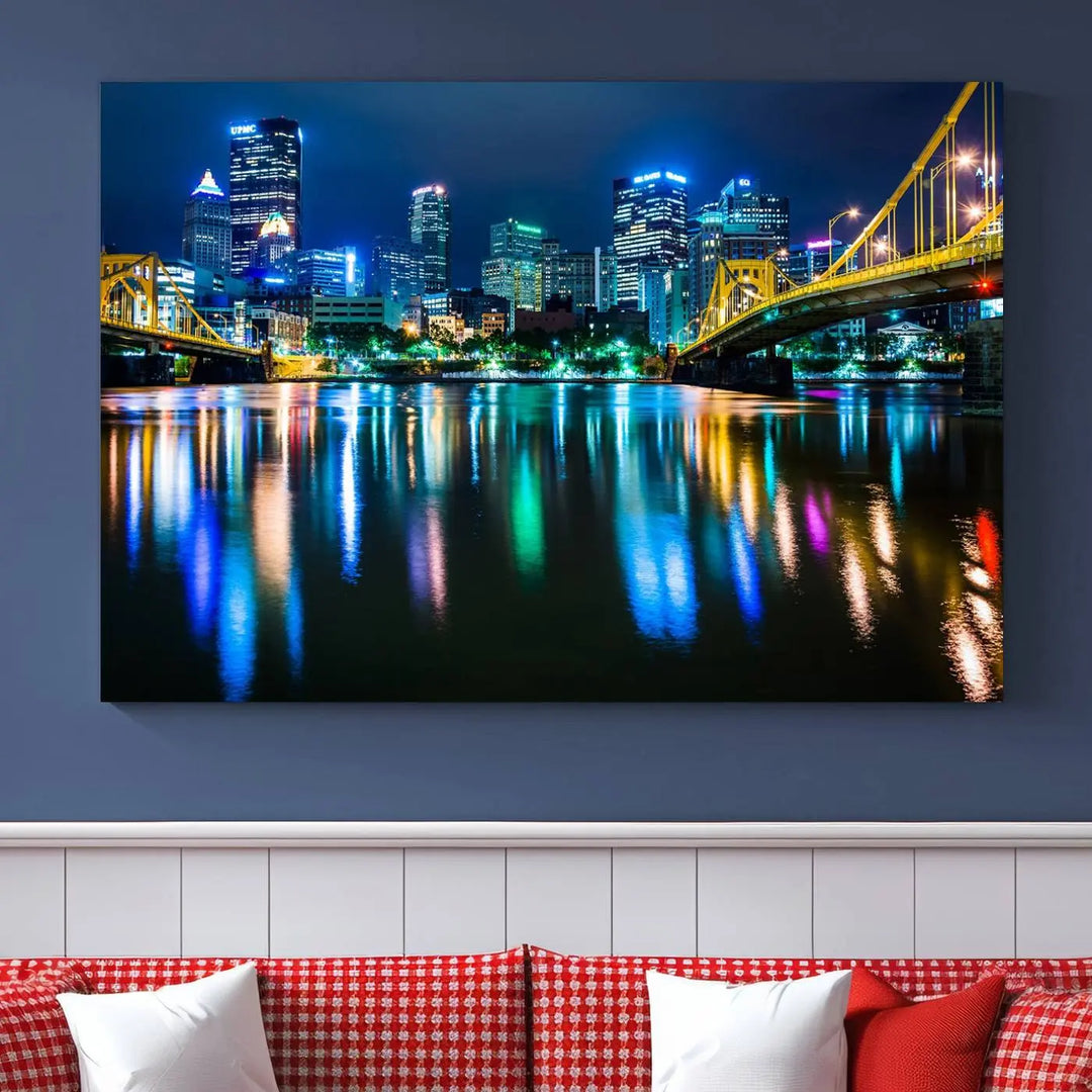 The "Downtown Pittsburgh at Night Canvas Wall Art" is a stunning museum-quality print that showcases the Pittsburgh skyline, reflecting over water and adorned with bright city lights.