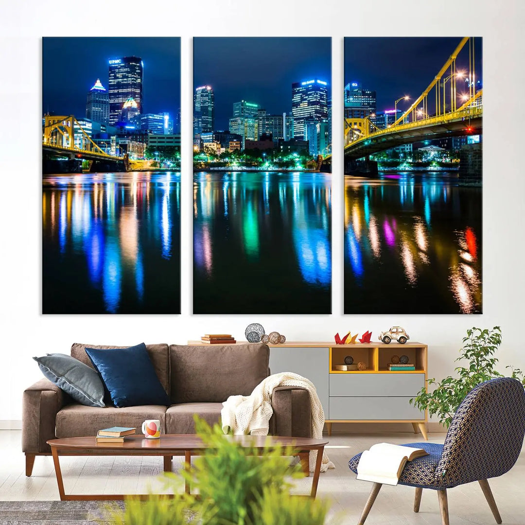 The "Downtown Pittsburgh at Night Canvas Wall Art" is a stunning museum-quality print that showcases the Pittsburgh skyline, reflecting over water and adorned with bright city lights.