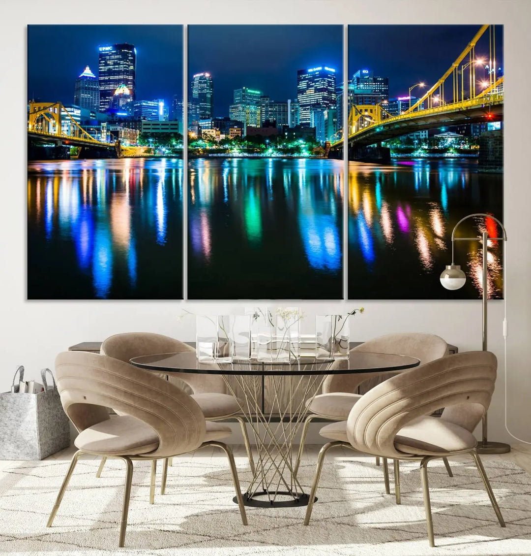 The "Downtown Pittsburgh at Night Canvas Wall Art" is a stunning museum-quality print that showcases the Pittsburgh skyline, reflecting over water and adorned with bright city lights.