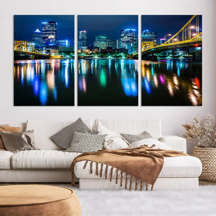 The "Downtown Pittsburgh at Night Canvas Wall Art" is a stunning museum-quality print that showcases the Pittsburgh skyline, reflecting over water and adorned with bright city lights.