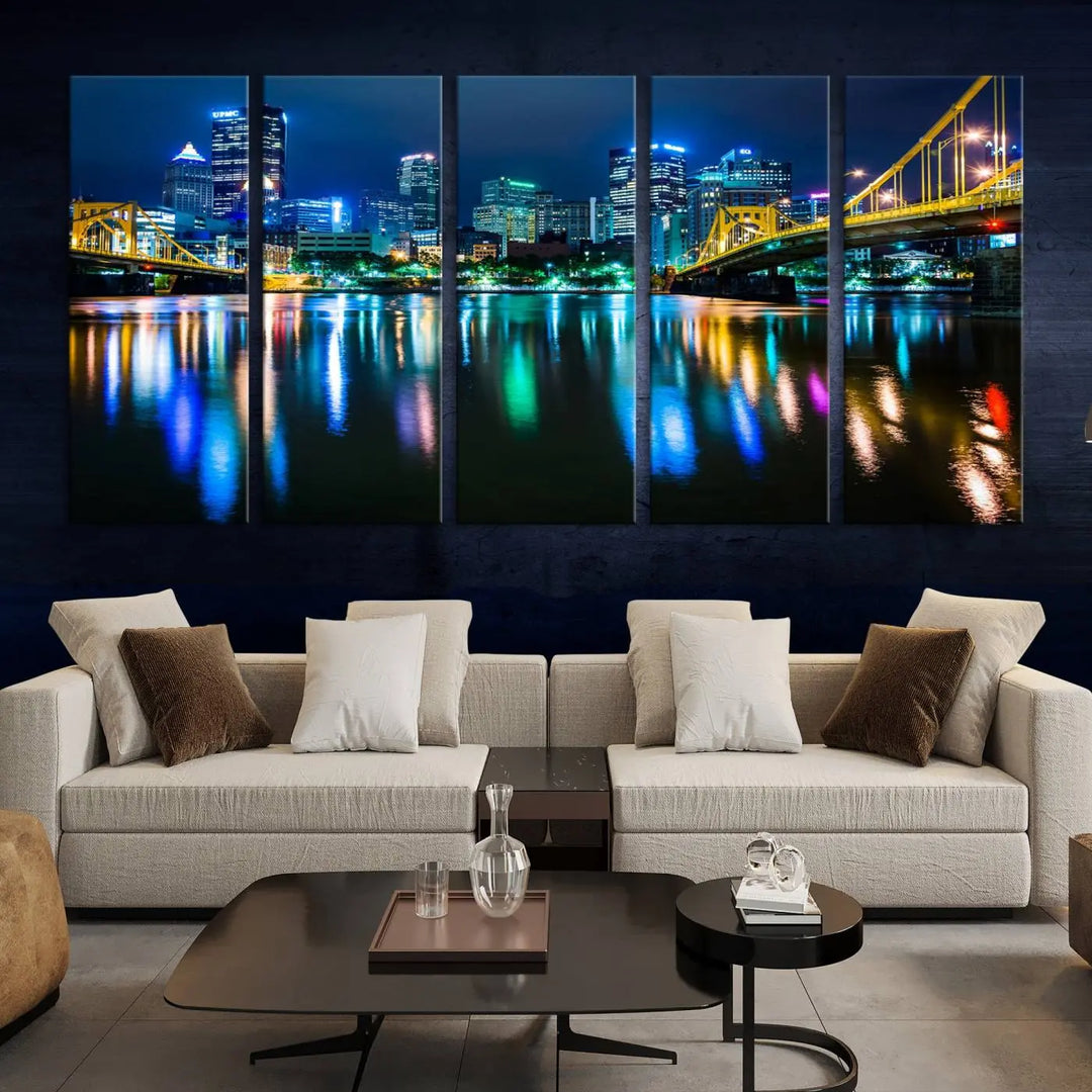 The "Downtown Pittsburgh at Night Canvas Wall Art" is a stunning museum-quality print that showcases the Pittsburgh skyline, reflecting over water and adorned with bright city lights.