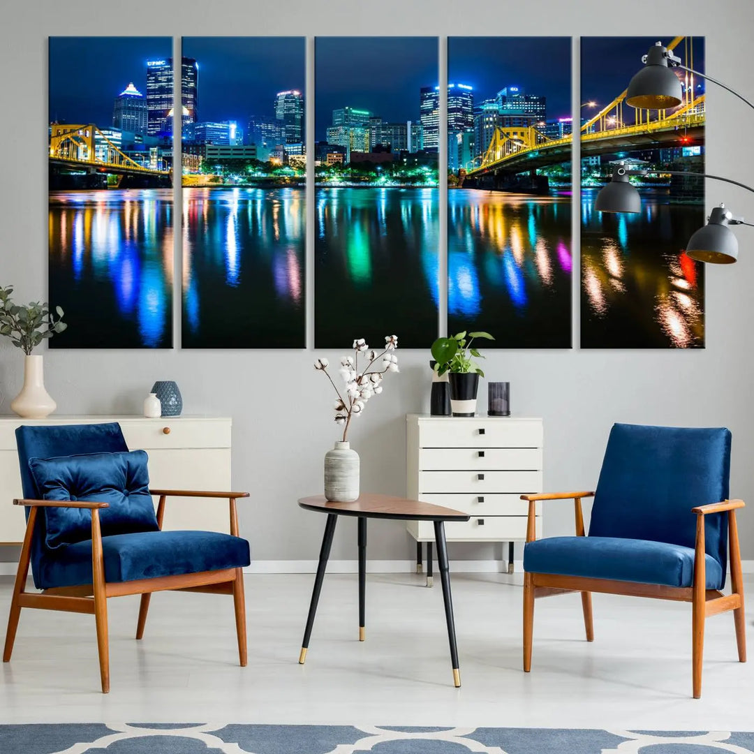 The "Downtown Pittsburgh at Night Canvas Wall Art" is a stunning museum-quality print that showcases the Pittsburgh skyline, reflecting over water and adorned with bright city lights.