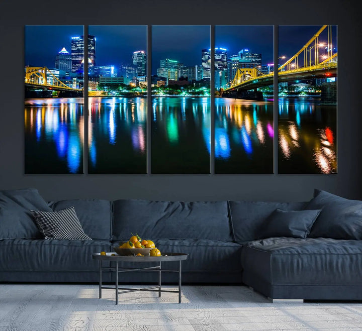 The "Downtown Pittsburgh at Night Canvas Wall Art" is a stunning museum-quality print that showcases the Pittsburgh skyline, reflecting over water and adorned with bright city lights.