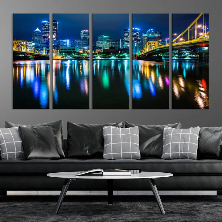 The "Downtown Pittsburgh at Night Canvas Wall Art" is a stunning museum-quality print that showcases the Pittsburgh skyline, reflecting over water and adorned with bright city lights.