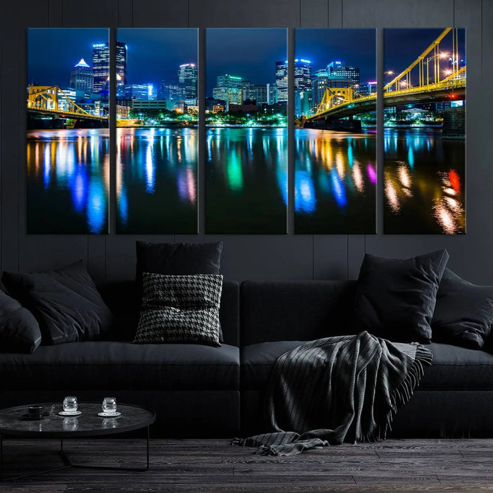 The "Downtown Pittsburgh at Night Canvas Wall Art" is a stunning museum-quality print that showcases the Pittsburgh skyline, reflecting over water and adorned with bright city lights.