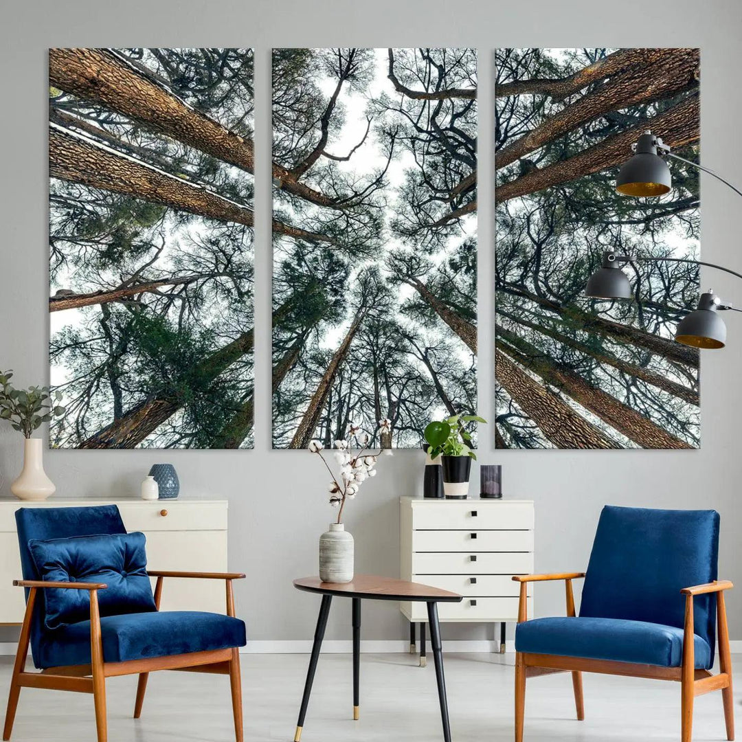 The "Dry Tree Branches Extending to the Sky" canvas print adorns the wall.