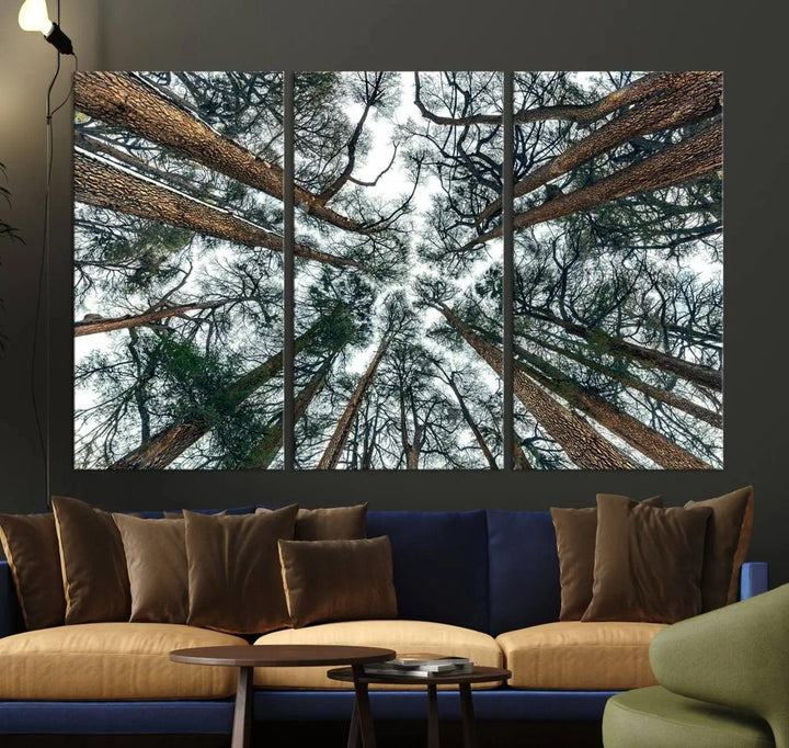 The "Dry Tree Branches Extending to the Sky" canvas print adorns the wall.