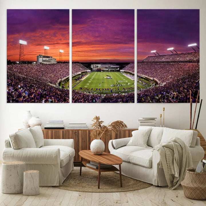 The East Carolina University Pirates Football Team Print, showcasing the vibrant Greenville Dowdy-Ficklen Stadium at sunset on museum-quality canvas and handcrafted in the USA, is a stunning piece of wall art.