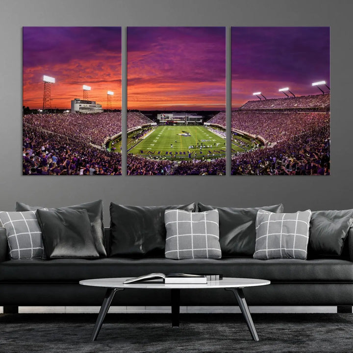 The East Carolina University Pirates Football Team Print, showcasing the vibrant Greenville Dowdy-Ficklen Stadium at sunset on museum-quality canvas and handcrafted in the USA, is a stunning piece of wall art.