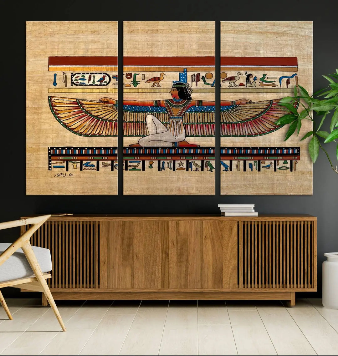 The "Egypt Isis Wall Art Canvas Print" features a winged figure in Egyptian style with high-resolution precision on museum-quality canvas, creating a striking visual impact.