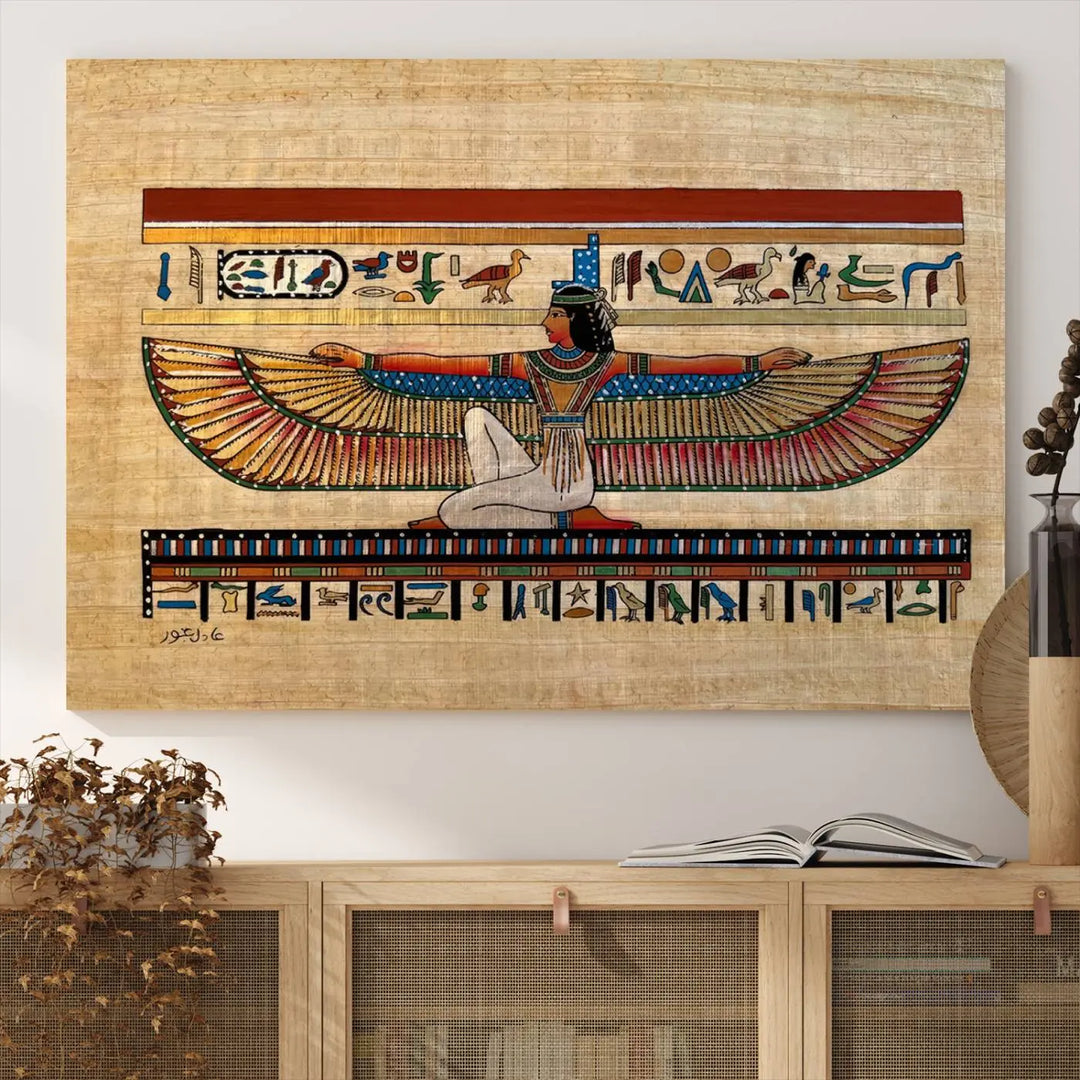 The "Egypt Isis Wall Art Canvas Print" features a winged figure in Egyptian style with high-resolution precision on museum-quality canvas, creating a striking visual impact.