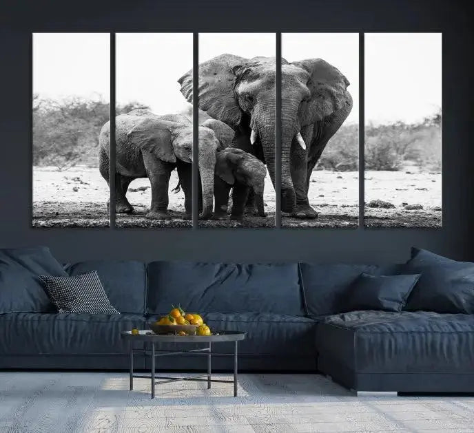 The Elephant Family Africa Wall Art Canvas Print, a black and white triptych of elephants, is presented as museum-quality canvas art.