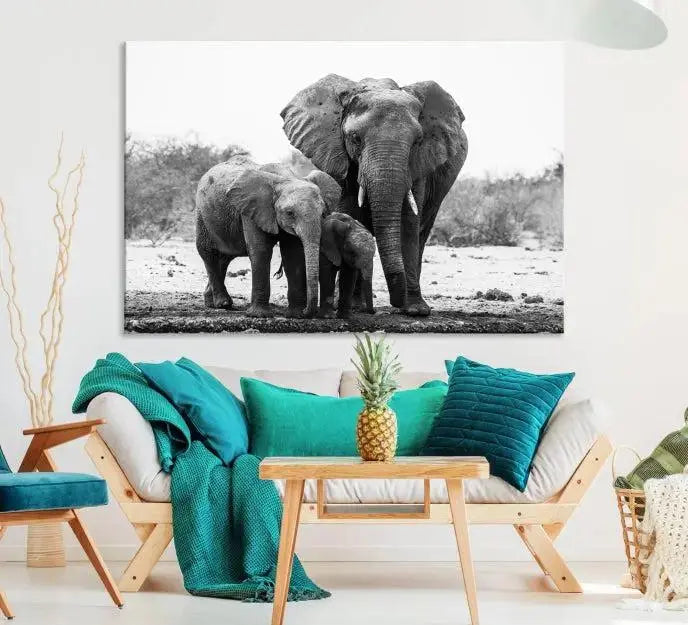 The Elephant Family Africa Wall Art Canvas Print, a black and white triptych of elephants, is presented as museum-quality canvas art.