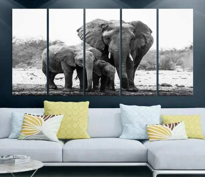 The Elephant Family Africa Wall Art Canvas Print, a black and white triptych of elephants, is presented as museum-quality canvas art.