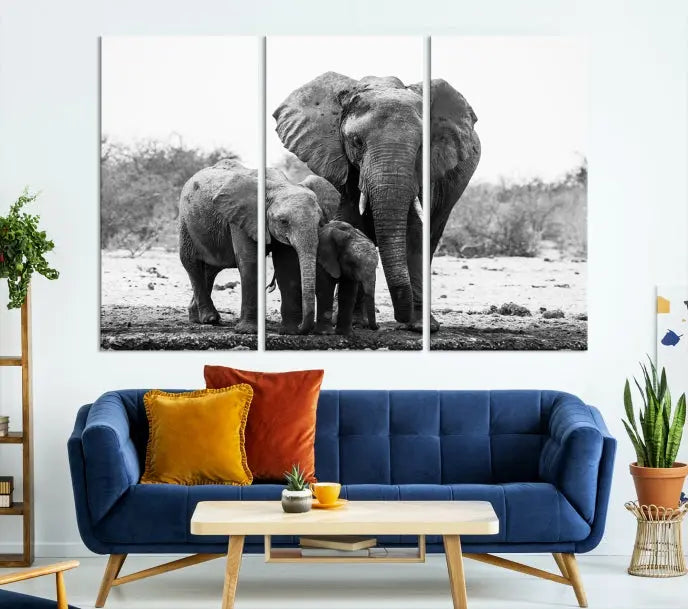 The Elephant Family Africa Wall Art Canvas Print, a black and white triptych of elephants, is presented as museum-quality canvas art.