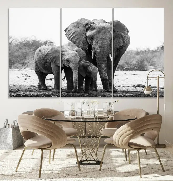 The Elephant Family Africa Wall Art Canvas Print, a black and white triptych of elephants, is presented as museum-quality canvas art.